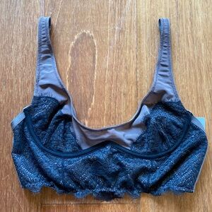 Urban outfitter lace eyelash corset style bra fits medium and small NWT